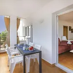 Apartment Punta Garbi By Interhome